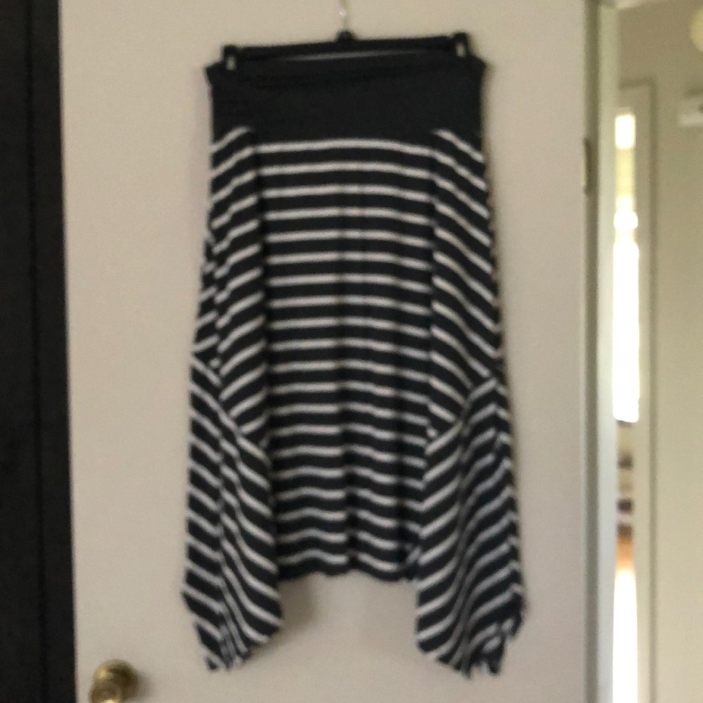 Asymmetrical  skirt with control top.